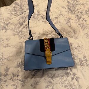 Gucci Blue Crossbody Bag with Gold Accents